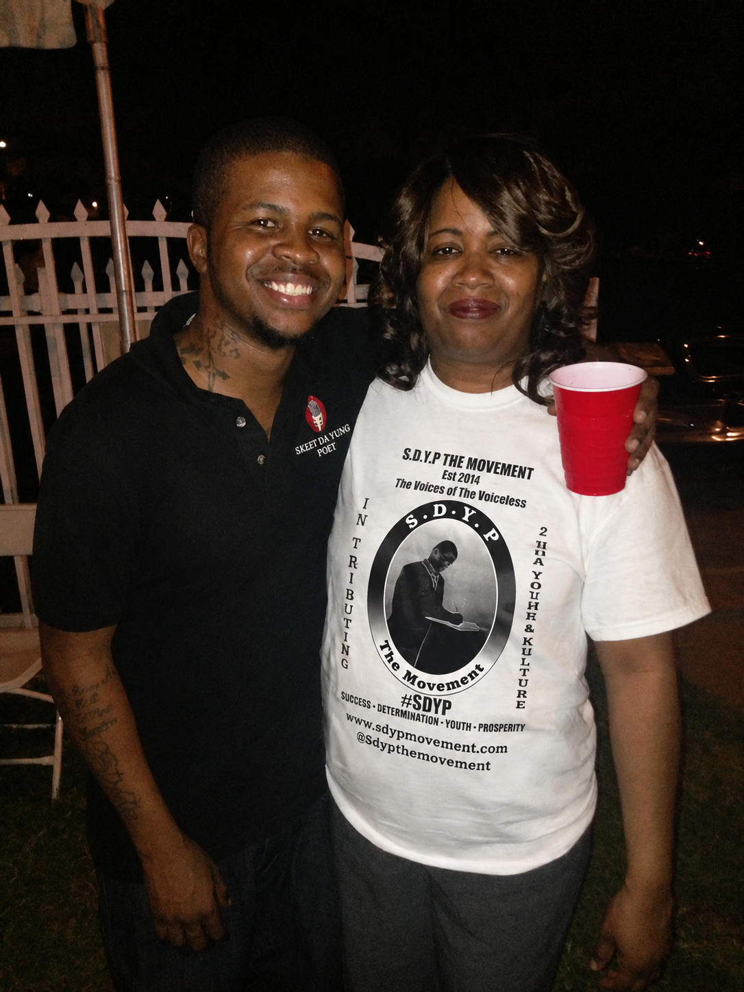 Devin Streeter (Skeet Da Yung Poet) with his mother wearing the original S.D.Y.P The Movement shirt